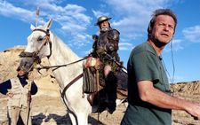 Jean Rochefort saddled up as Don Quixote on location in Spain with Terry Gilliam